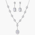 Elegant white gold plated jewelry set with oval cubic zirconia stones in halo settings, featuring Y-necklace and drop earrings.
